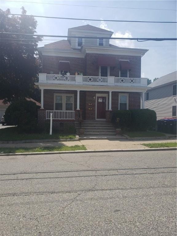 106 Langdon St, Providence, RI 02904 - view of front of property with a balcony and covered porch