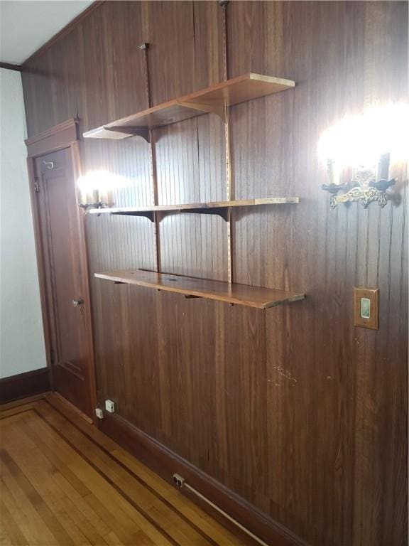 106 Langdon St, Providence, RI 02904 - detailed view of wood finished floors, wood walls, and a chandelier