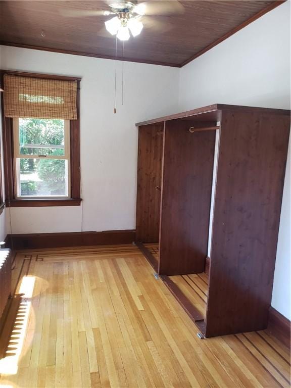 106 Langdon St, Providence, RI 02904 - unfurnished bedroom featuring light wood-type flooring, crown molding, and ceiling fan