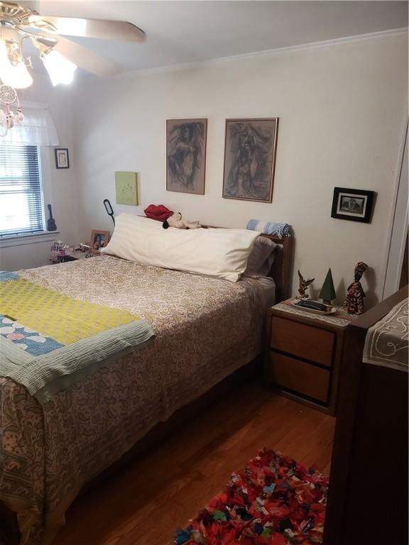 106 Langdon St, Providence, RI 02904 - bedroom with dark wood-type flooring, crown molding, and ceiling fan