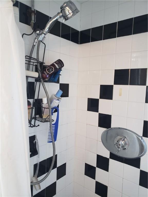 106 Langdon St, Providence, RI 02904 - full bath featuring a tile shower