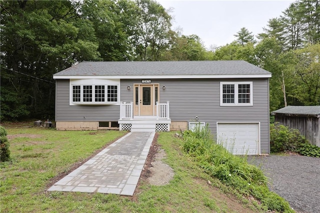 154 Foster Center Rd, Foster, RI 02825 - view of front of house featuring a garage, a front lawn, and gravel driveway