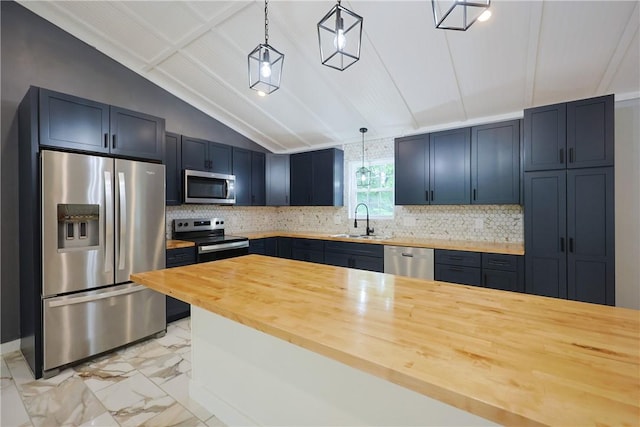 154 Foster Center Rd, Foster, RI 02825 - kitchen featuring appliances with stainless steel finishes, butcher block countertops, light marble finish floors, pendant lighting, and lofted ceiling