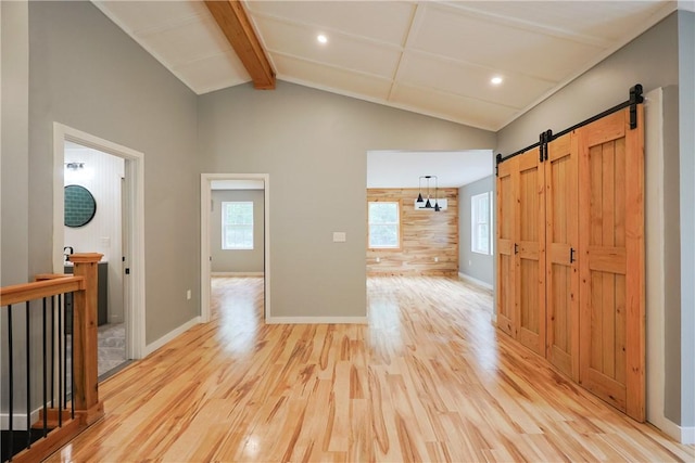 154 Foster Center Rd, Foster, RI 02825 - entryway featuring light wood-type flooring, healthy amount of natural light, a barn door, recessed lighting, and beamed ceiling