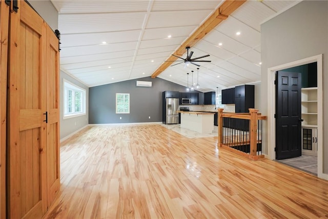 154 Foster Center Rd, Foster, RI 02825 - unfurnished living room featuring light wood-style floors, a ceiling fan, a barn door, and recessed lighting