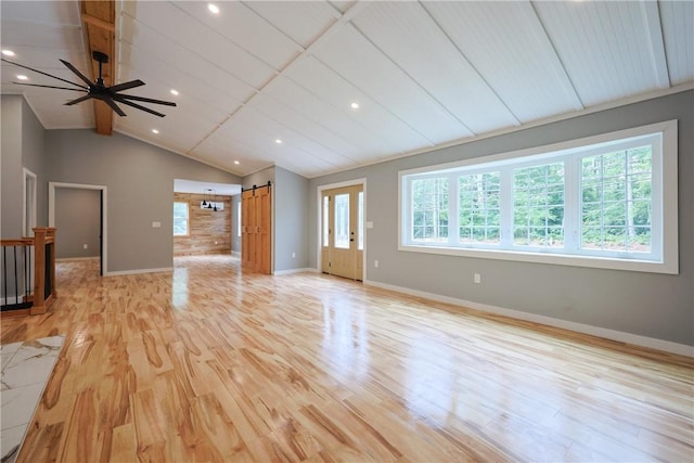 154 Foster Center Rd, Foster, RI 02825 - unfurnished living room featuring a barn door, plenty of natural light, light wood-type flooring, recessed lighting, and ceiling fan