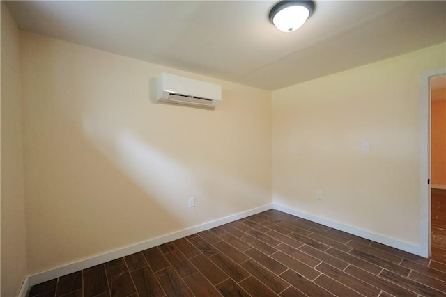 154 Foster Center Rd, Foster, RI 02825 - empty room with a wall mounted air conditioner and dark wood-style flooring