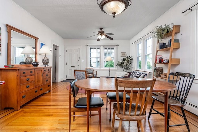 25 Sheffield Ave, North Providence, RI 02911 - dining area featuring a ceiling fan, light wood-style flooring, and baseboard heating