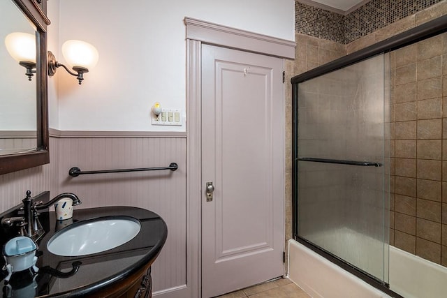 25 Sheffield Ave, North Providence, RI 02911 - full bathroom with a wainscoted wall, enclosed tub / shower combo, tile patterned flooring, and vanity