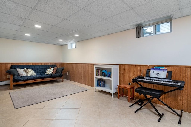 25 Sheffield Ave, North Providence, RI 02911 - sitting room with wainscoting, a paneled ceiling, healthy amount of natural light, wooden walls, and recessed lighting