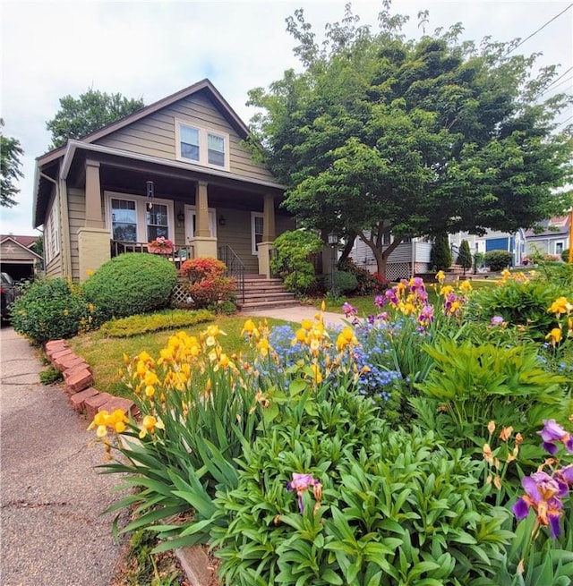 25 Sheffield Ave, North Providence, RI 02911 - view of front facade featuring covered porch