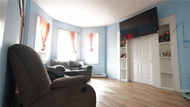 271 Union Ave, Providence, RI 02909 - living room featuring a baseboard radiator