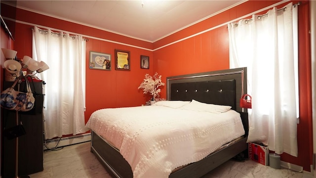 271 Union Ave, Providence, RI 02909 - bedroom with crown molding, a baseboard radiator, and marble look tiles
