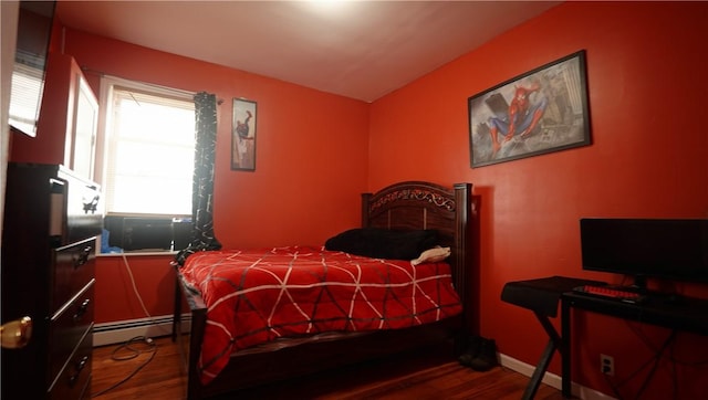 271 Union Ave, Providence, RI 02909 - bedroom with a baseboard heating unit and wood finished floors
