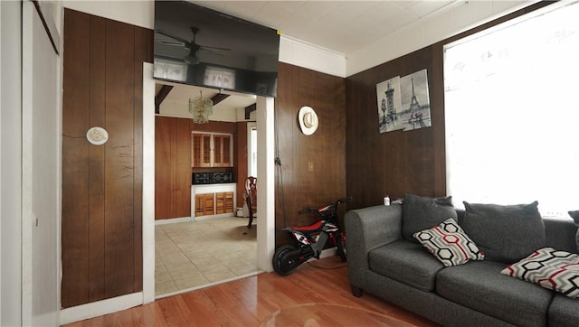271 Union Ave, Providence, RI 02909 - living area featuring a ceiling fan, wood finished floors, and wood walls