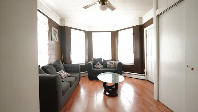 271 Union Ave, Providence, RI 02909 - living area featuring a baseboard radiator, ceiling fan, and light wood-type flooring