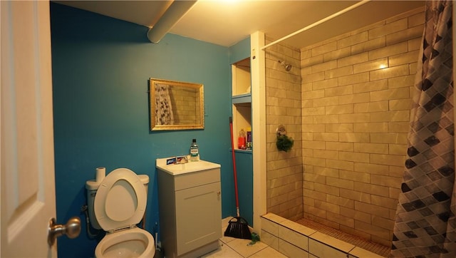271 Union Ave, Providence, RI 02909 - bathroom featuring a tile shower, vanity, and tile patterned floors