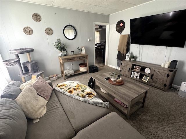 494 Grove St, Woonsocket, RI 02895 - carpeted living area featuring a wood stove and a ceiling fan