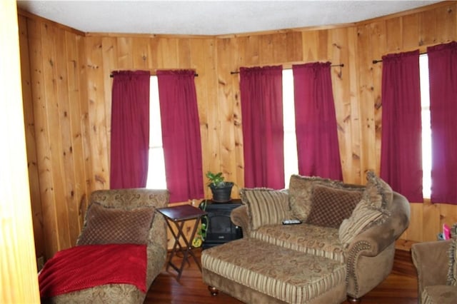 494 Grove St, Woonsocket, RI 02895 - living area featuring wooden walls and wood finished floors
