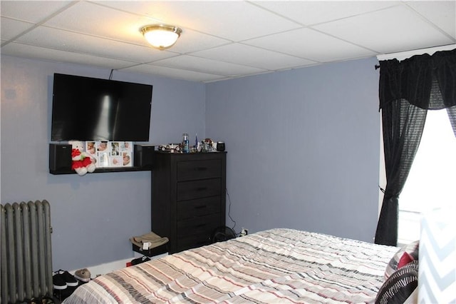 494 Grove St, Woonsocket, RI 02895 - bedroom featuring radiator and a drop ceiling