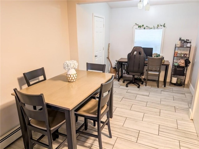 10 Stamford Ave, Providence, RI 02907 - dining area with baseboard heating, wood finish floors, and an office area