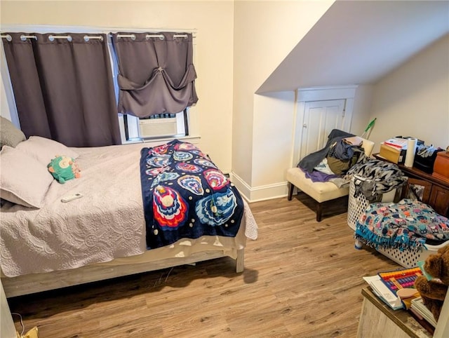 10 Stamford Ave, Providence, RI 02907 - bedroom with wood finished floors and cooling unit