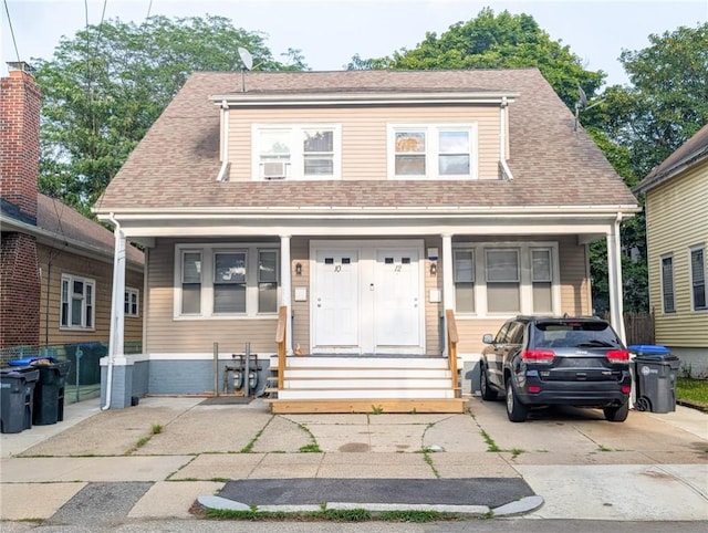 10 Stamford Ave, Providence, RI 02907 - bungalow featuring a porch and roof with shingles