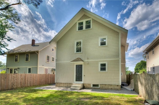58 Cliffdale Ave, Cranston, RI 02905 - rear view of house featuring entry steps and a fenced backyard