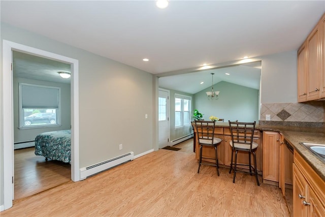 40 Lufkin Ct, Warwick, RI 02888 - kitchen featuring a baseboard heating unit, baseboard heating, light wood-style floors, lofted ceiling, and recessed lighting