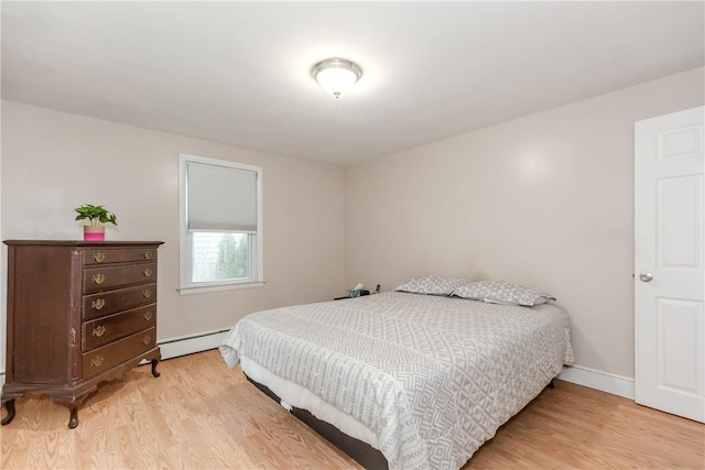 40 Lufkin Ct, Warwick, RI 02888 - bedroom with a baseboard radiator and wood finished floors