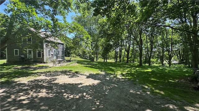 815 Beacon Hill Rd, Block Island, RI 02807 - view of green lawn featuring a patio area