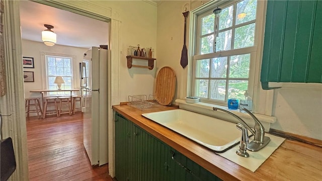 815 Beacon Hill Rd, Block Island, RI 02807 - hall featuring dark wood-style flooring and a sink