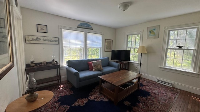 815 Beacon Hill Rd, Block Island, RI 02807 - living area with hardwood / wood-style floors and baseboards