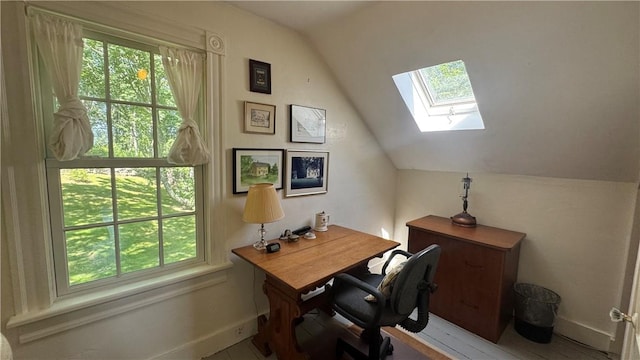 815 Beacon Hill Rd, Block Island, RI 02807 - office area with lofted ceiling, a skylight, and healthy amount of natural light