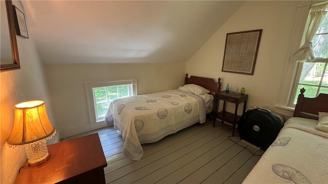 815 Beacon Hill Rd, Block Island, RI 02807 - bedroom with vaulted ceiling and wood finished floors