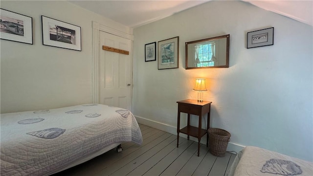 815 Beacon Hill Rd, Block Island, RI 02807 - bedroom with wood finished floors and baseboards