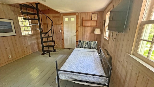 815 Beacon Hill Rd, Block Island, RI 02807 - entryway with wood walls, stairs, and wood-type flooring