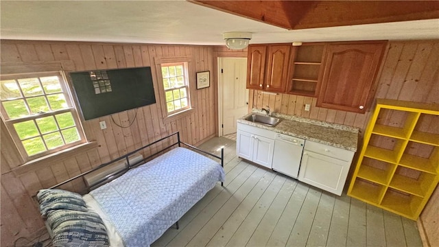 815 Beacon Hill Rd, Block Island, RI 02807 - kitchen featuring white dishwasher, wooden walls, open shelves, light wood finished floors, and white cabinets