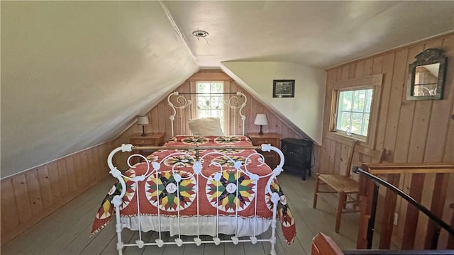 815 Beacon Hill Rd, Block Island, RI 02807 - bedroom with wooden walls, lofted ceiling, and wood finished floors