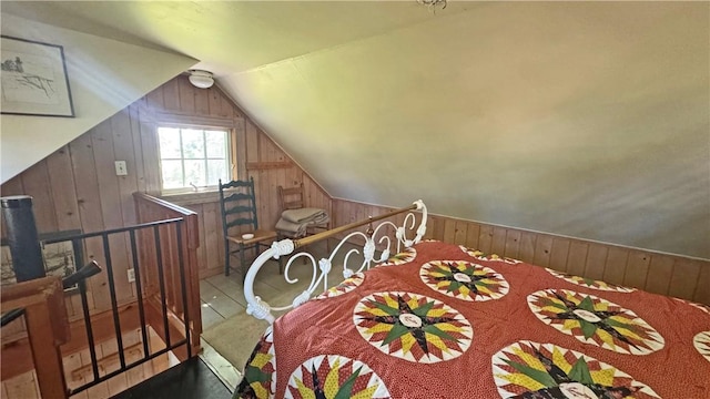 815 Beacon Hill Rd, Block Island, RI 02807 - staircase with wood walls and vaulted ceiling