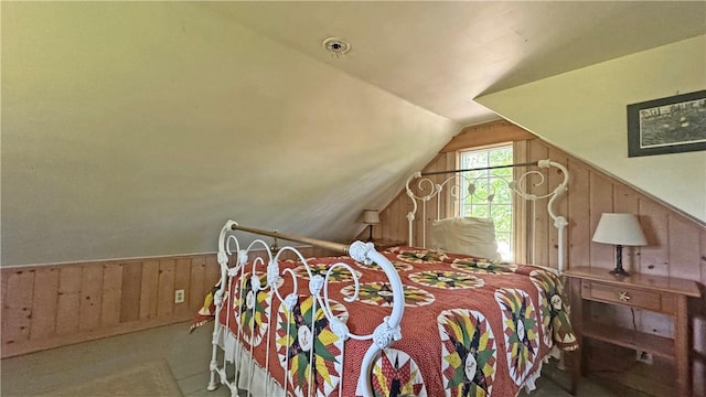 815 Beacon Hill Rd, Block Island, RI 02807 - carpeted bedroom with wooden walls and vaulted ceiling