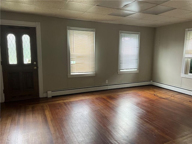 66 Railroad St, South Kingstown, RI 02879 - foyer featuring wood finished floors, baseboard heating, and a drop ceiling