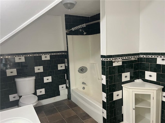 66 Railroad St, South Kingstown, RI 02879 - full bath with tile walls, shower / bath combination, wainscoting, and tile patterned floors