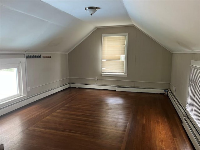 66 Railroad St, South Kingstown, RI 02879 - bonus room featuring wood finished floors, vaulted ceiling, and baseboard heating