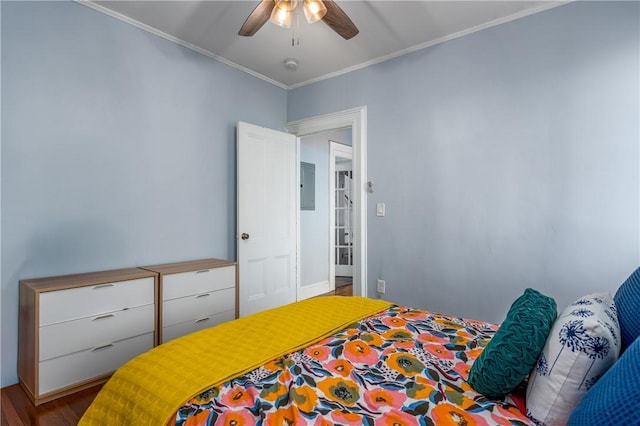 121 Doyle Ave Unit 2, Providence, RI 02906 - bedroom featuring electric panel, crown molding, wood finished floors, and ceiling fan