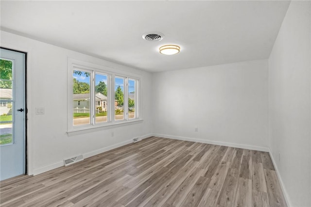 299 George Arden Ave, Warwick, RI 02886 - empty room featuring light wood finished floors and baseboards