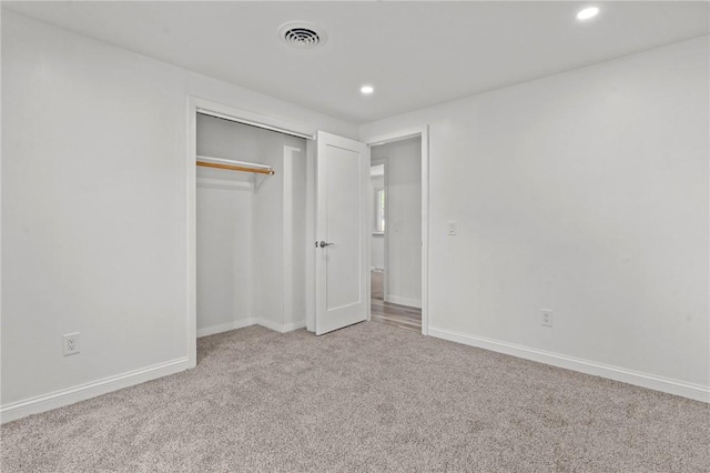 299 George Arden Ave, Warwick, RI 02886 - unfurnished bedroom with carpet flooring, recessed lighting, and a closet