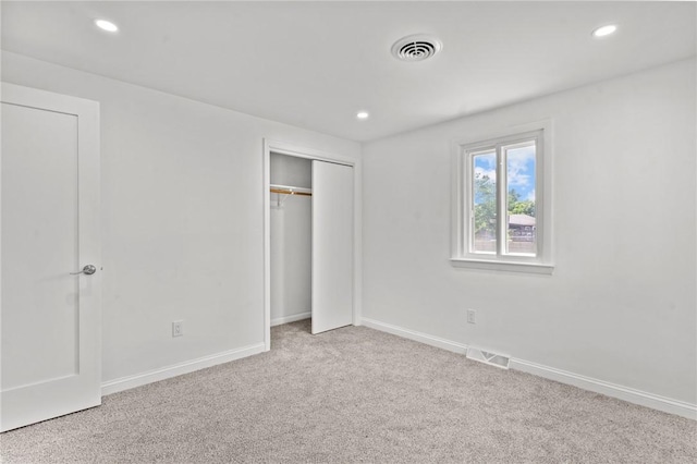 299 George Arden Ave, Warwick, RI 02886 - unfurnished bedroom with carpet floors, recessed lighting, and a closet