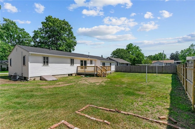 299 George Arden Ave, Warwick, RI 02886 - rear view of property with a wooden deck and a fenced backyard