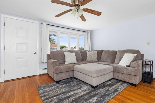 41 Valley View Dr, Cumberland, RI 02864 - living room featuring a baseboard radiator, light wood-type flooring, and ceiling fan